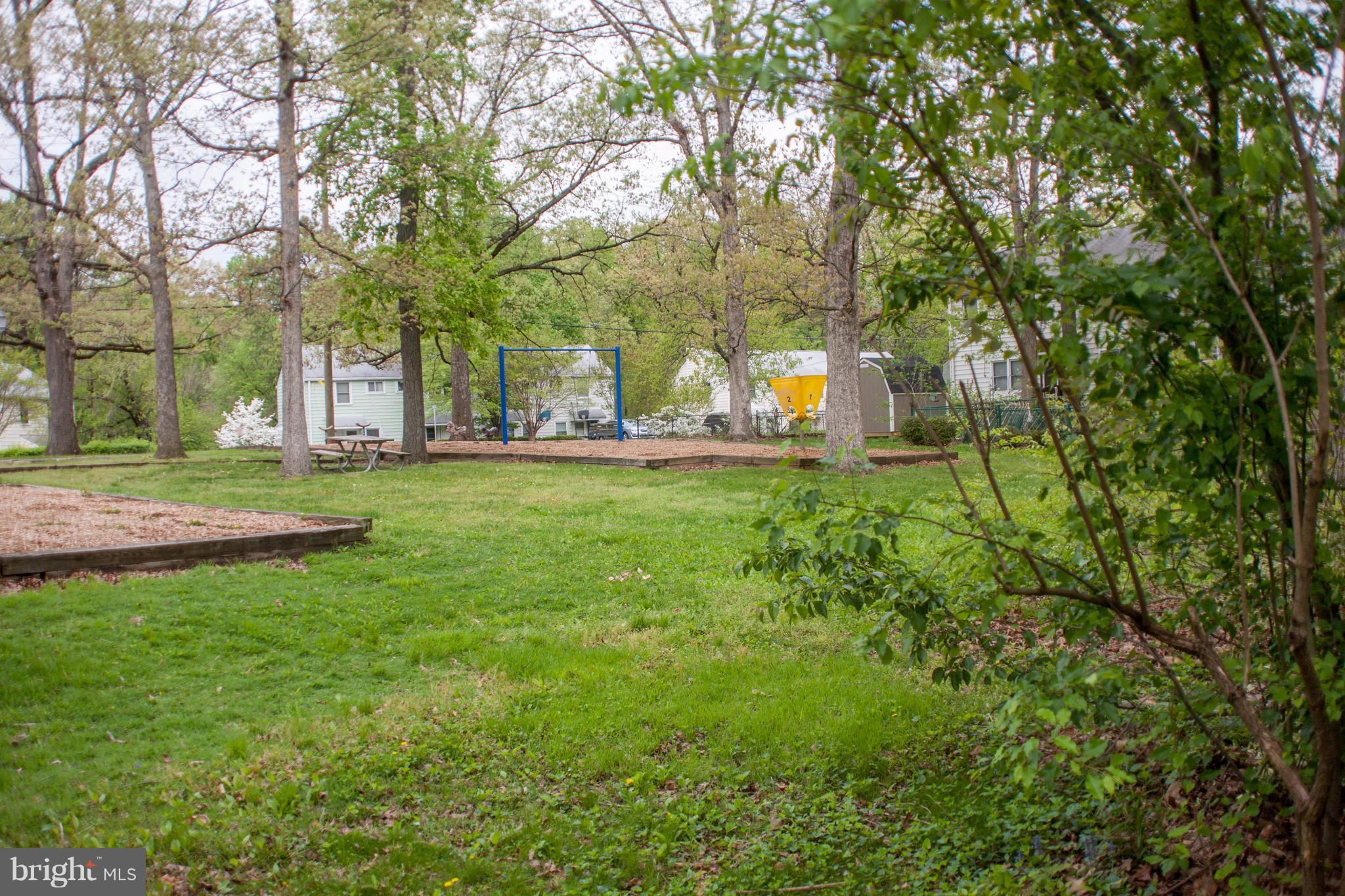 54 Ridge Road, Unit K Greenbelt, MD 20770 - Photo 22 of 29 a view of a park with large trees