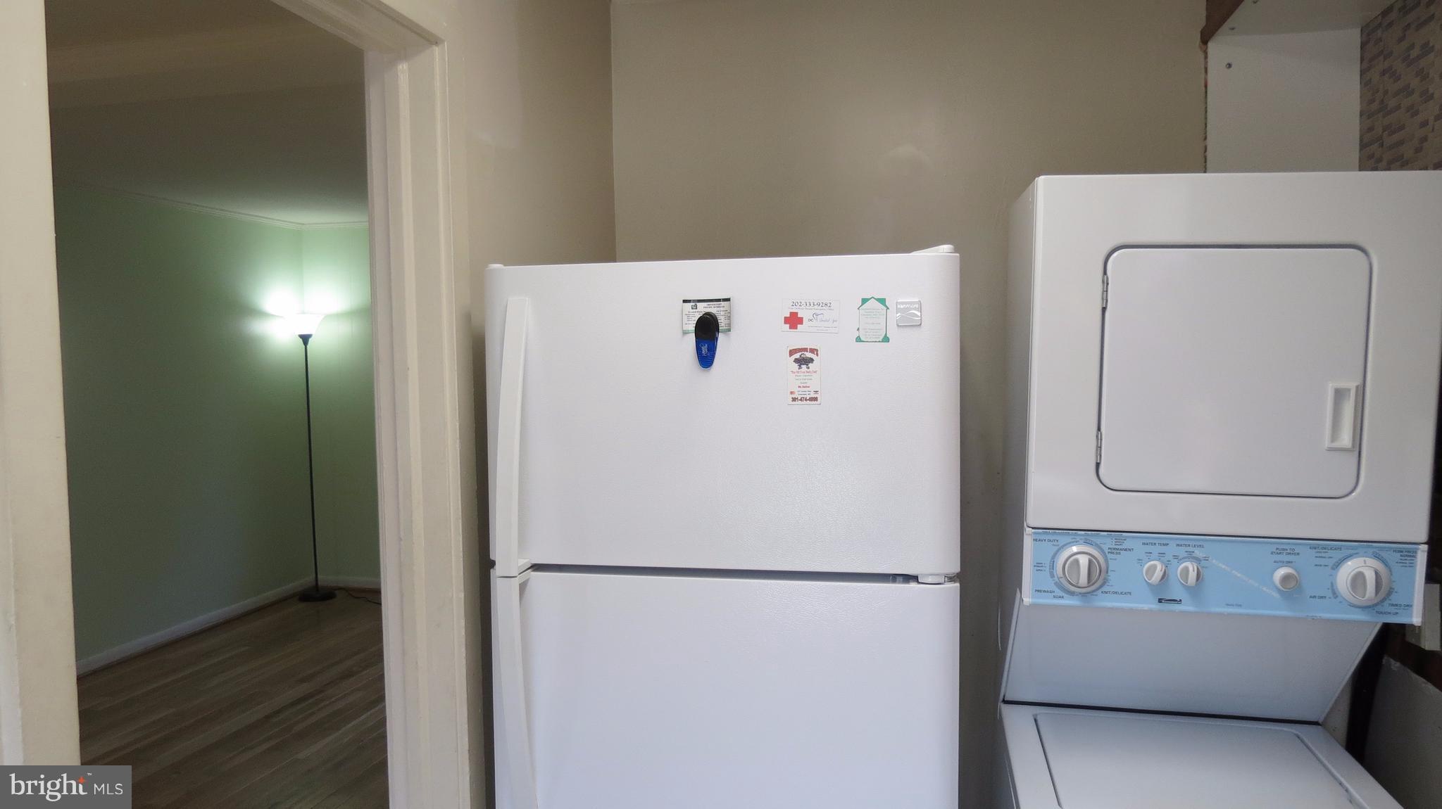 54 Ridge Road, Unit K Greenbelt, MD 20770 - Photo 4 of 29 a white refrigerator freezer sitting inside of a kitchen