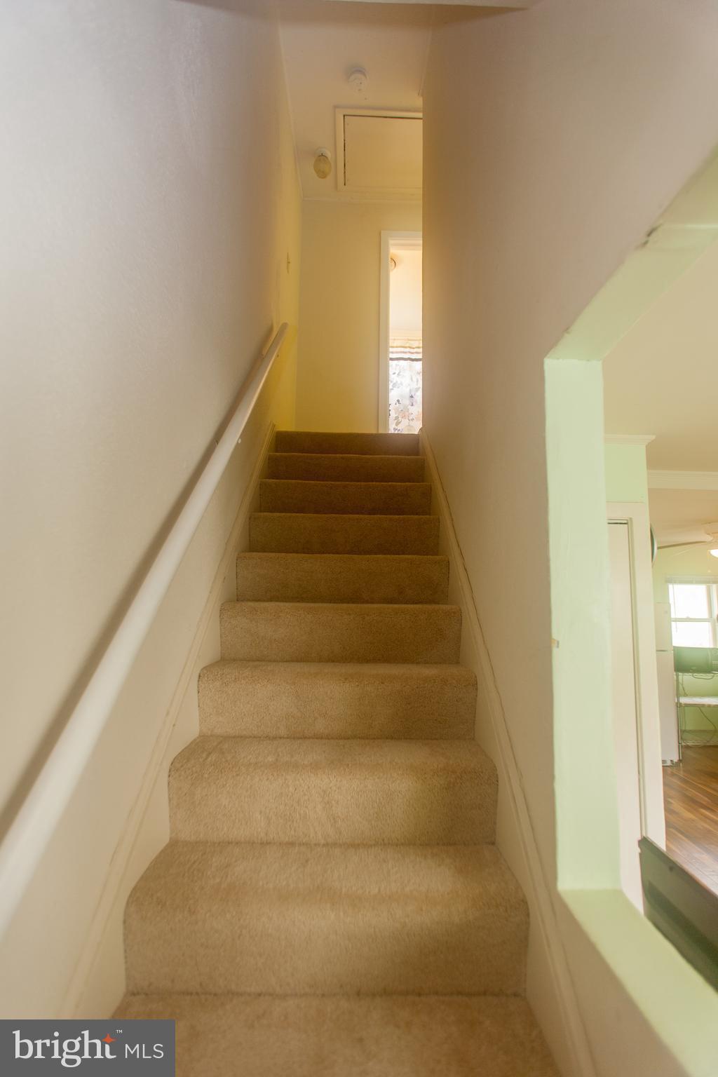 54 Ridge Road, Unit K Greenbelt, MD 20770 - Photo 10 of 29 a view of entryway and hall with wooden floor