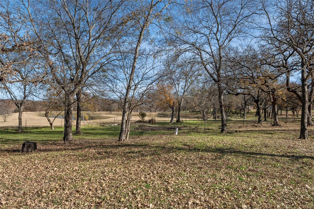 221 Saffle Road Robinson, TX 76706 - Photo 25 of 40 a view of a house with a yard