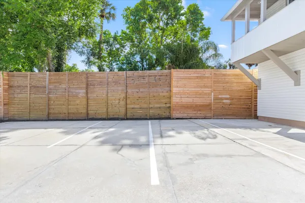 a view of a wooden fence