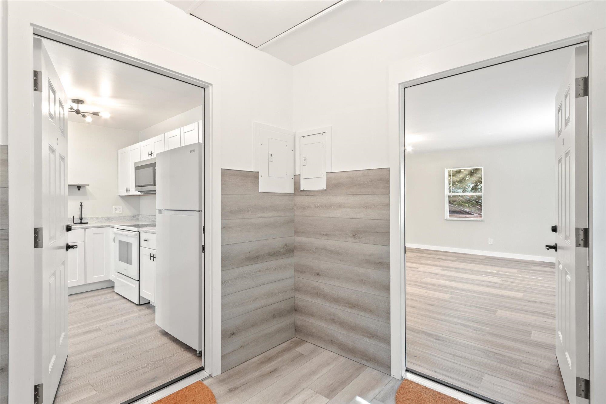 28 Sebastian Avenue, Unit D St. Augustine, FL 32084 - Photo 5 of 23 a bathroom with a shower and closet