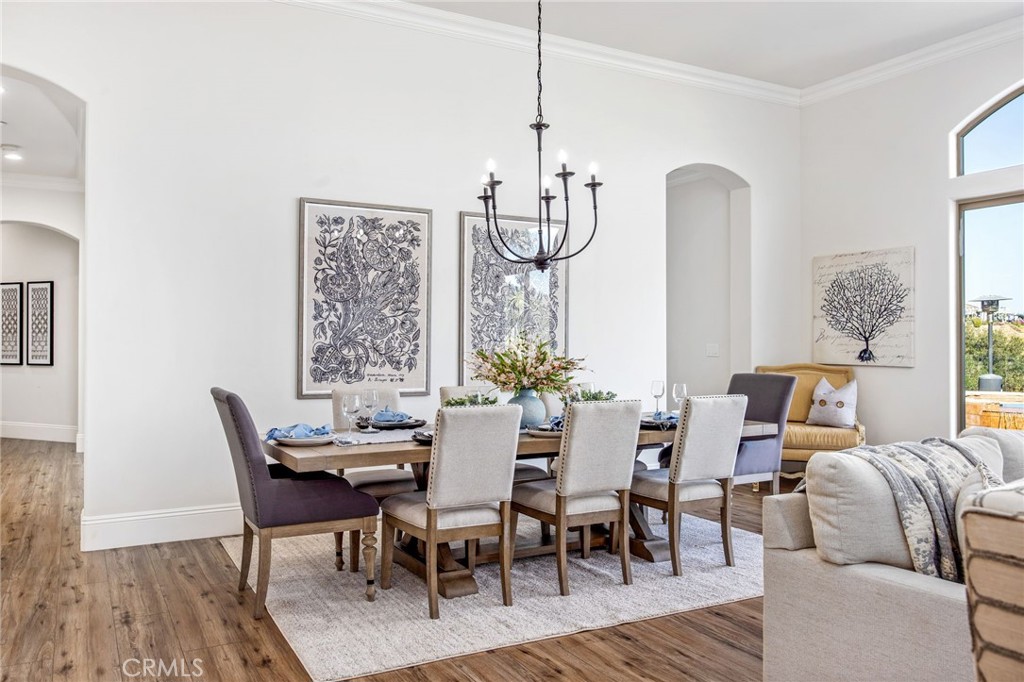 4709 Briana Court Fallbrook, CA 92028 - Photo 10 of 57 a view of a dining room with furniture window and wooden floor
