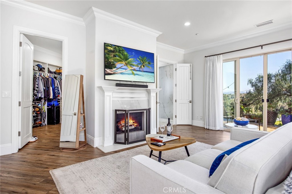 4709 Briana Court Fallbrook, CA 92028 - Photo 26 of 57 a living room with furniture and a fireplace