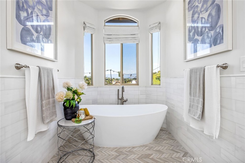 4709 Briana Court Fallbrook, CA 92028 - Photo 28 of 57 a white bath tub sitting next to a window
