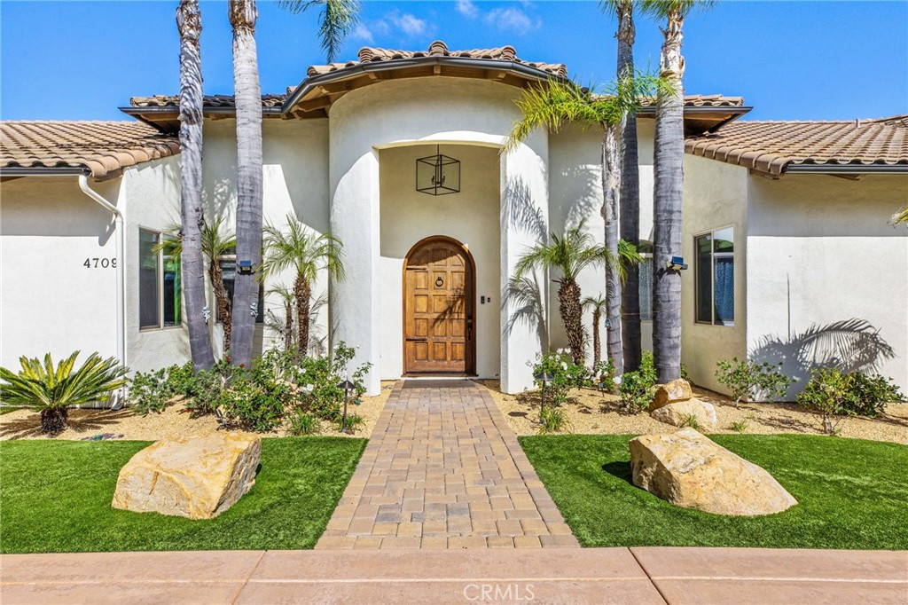 4709 Briana Court Fallbrook, CA 92028 - Photo 2 of 57 a front view of a house with garden