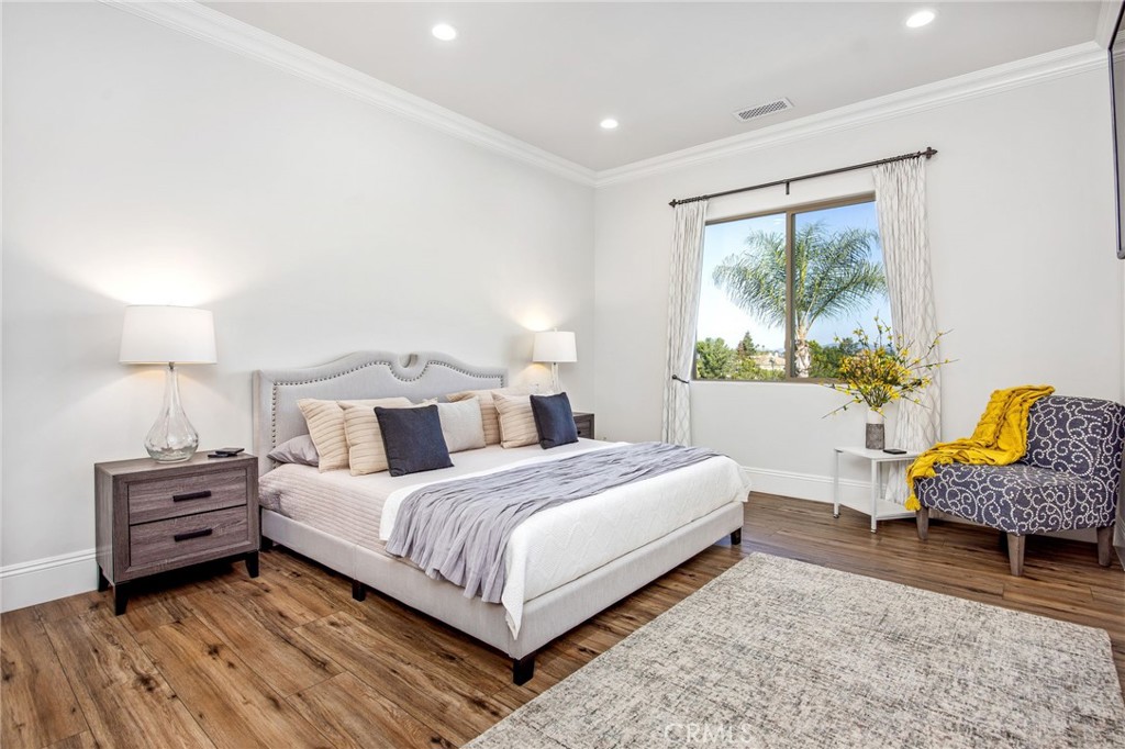 4709 Briana Court Fallbrook, CA 92028 - Photo 33 of 57 a bedroom with a bed and a window