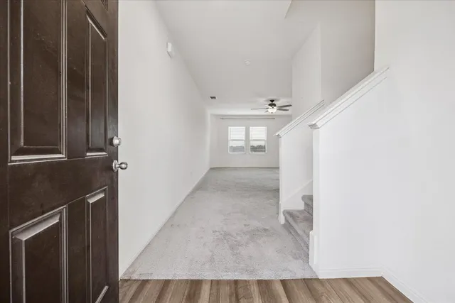 a view of entryway with wooden floor