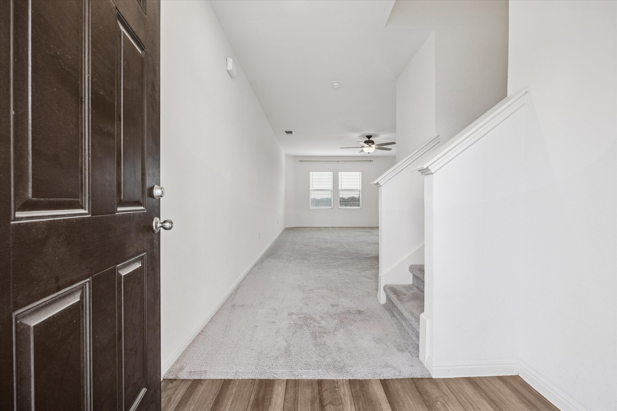 208 Night Riders Way Jarrell, TX 76537 - Photo 11 of 31 a view of entryway with wooden floor