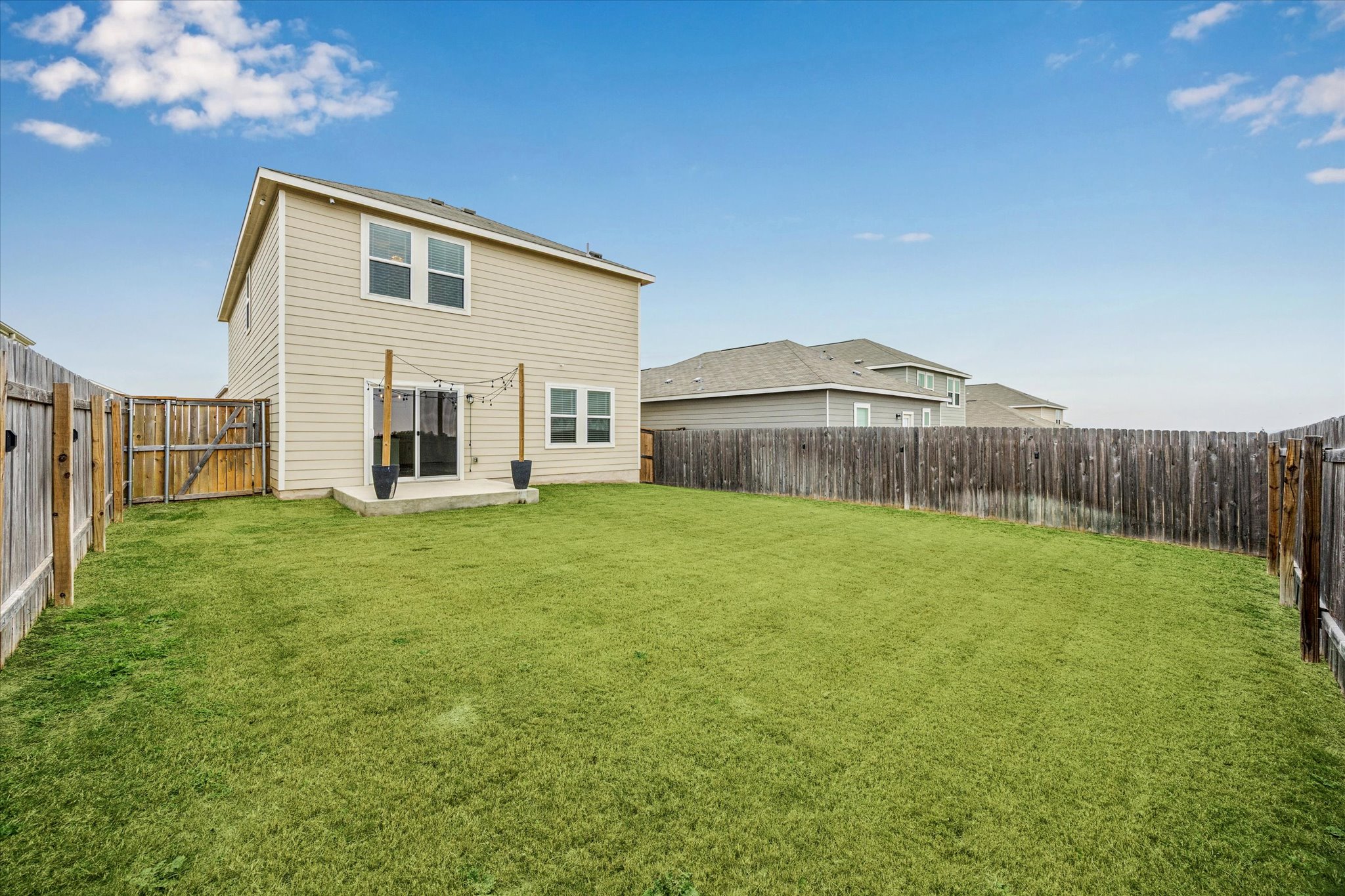 208 Night Riders Way Jarrell, TX 76537 - Photo 27 of 31 a view of a house with backyard and garden