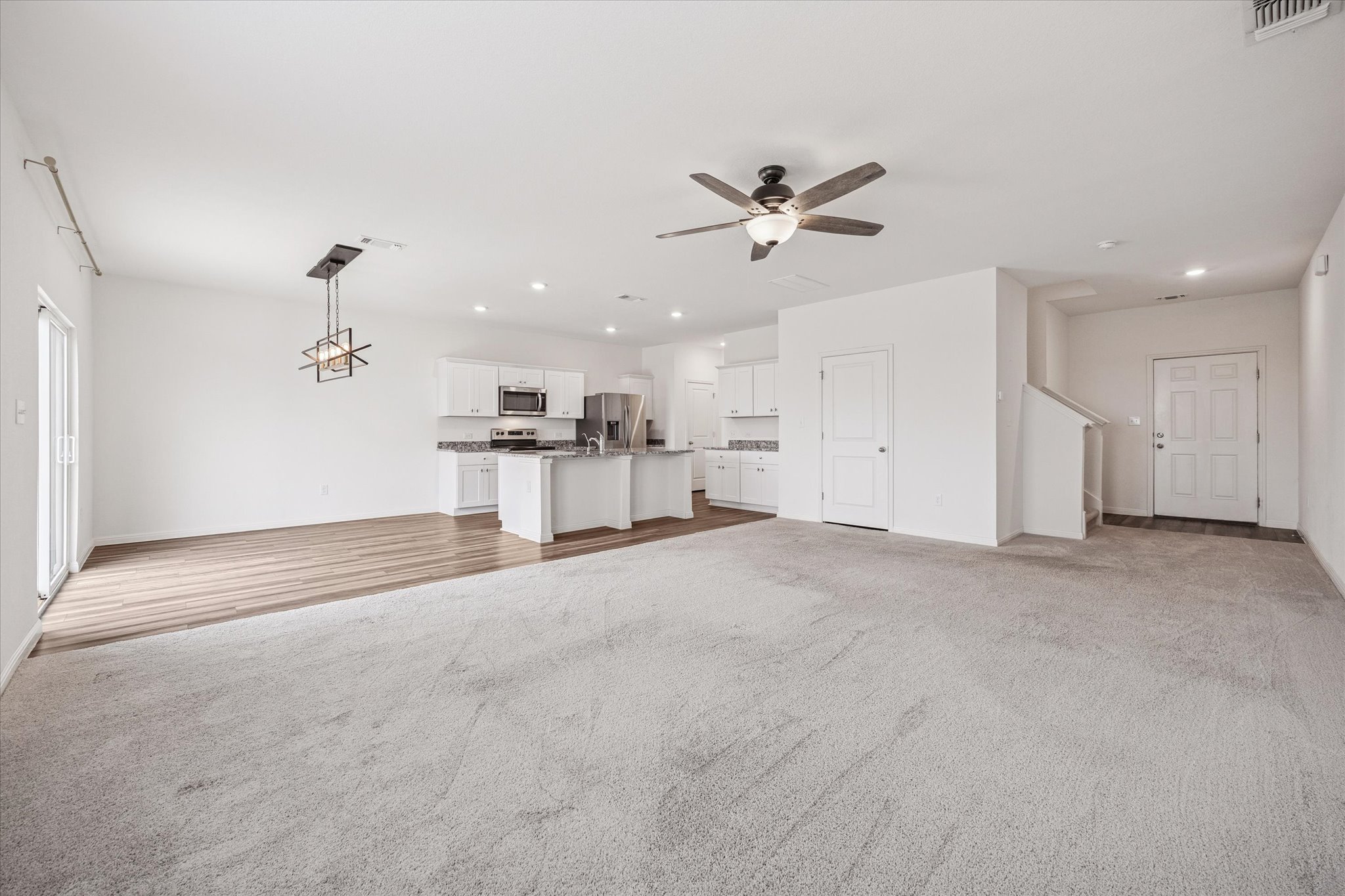 208 Night Riders Way Jarrell, TX 76537 - Photo 8 of 31 a view of a big room with a kitchen