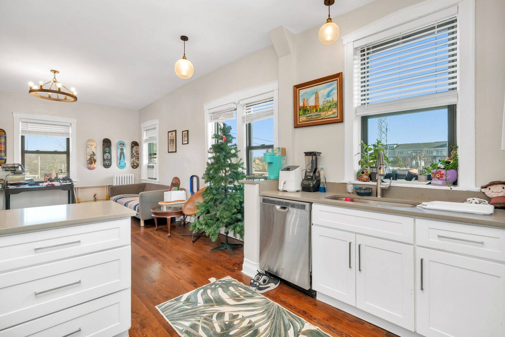319 Calendar Avenue, Unit 3D La Grange, IL 60525 - Photo 2 of 7 a kitchen with white cabinets and sink