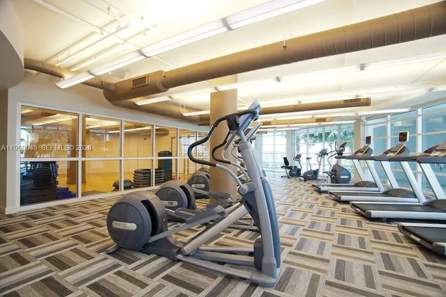 a living room with patio furniture