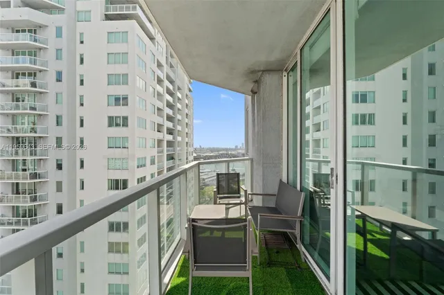 a view of a balcony and chairs