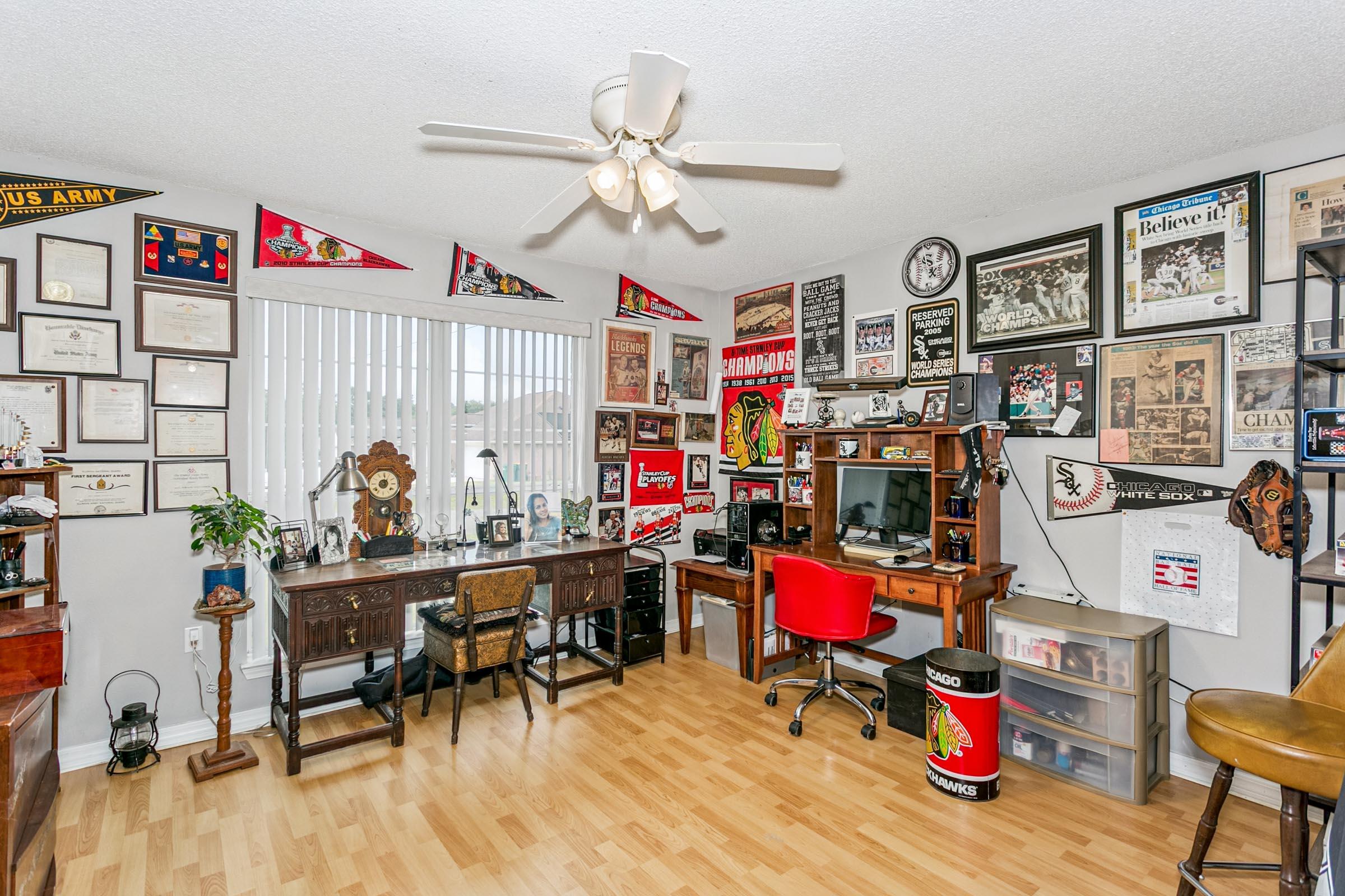 2246 Titanium Drive Crestview, FL 32536 - Photo 19 of 38 a living room with furniture and a wooden floor