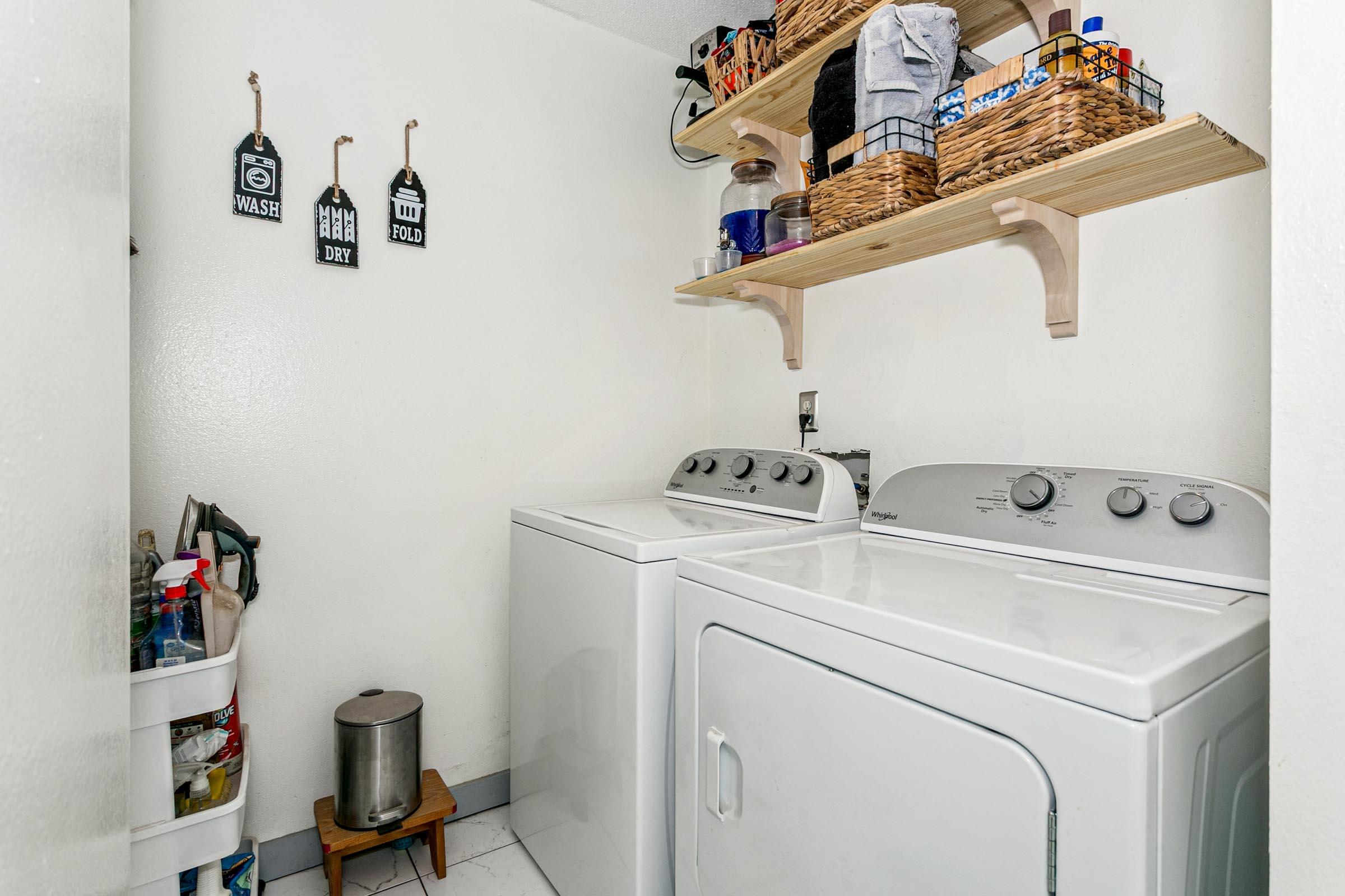 2246 Titanium Drive Crestview, FL 32536 - Photo 21 of 38 a utility room with dryer and washer