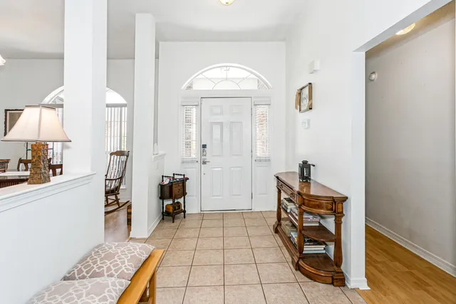 a view of livingroom with furniture and workspace
