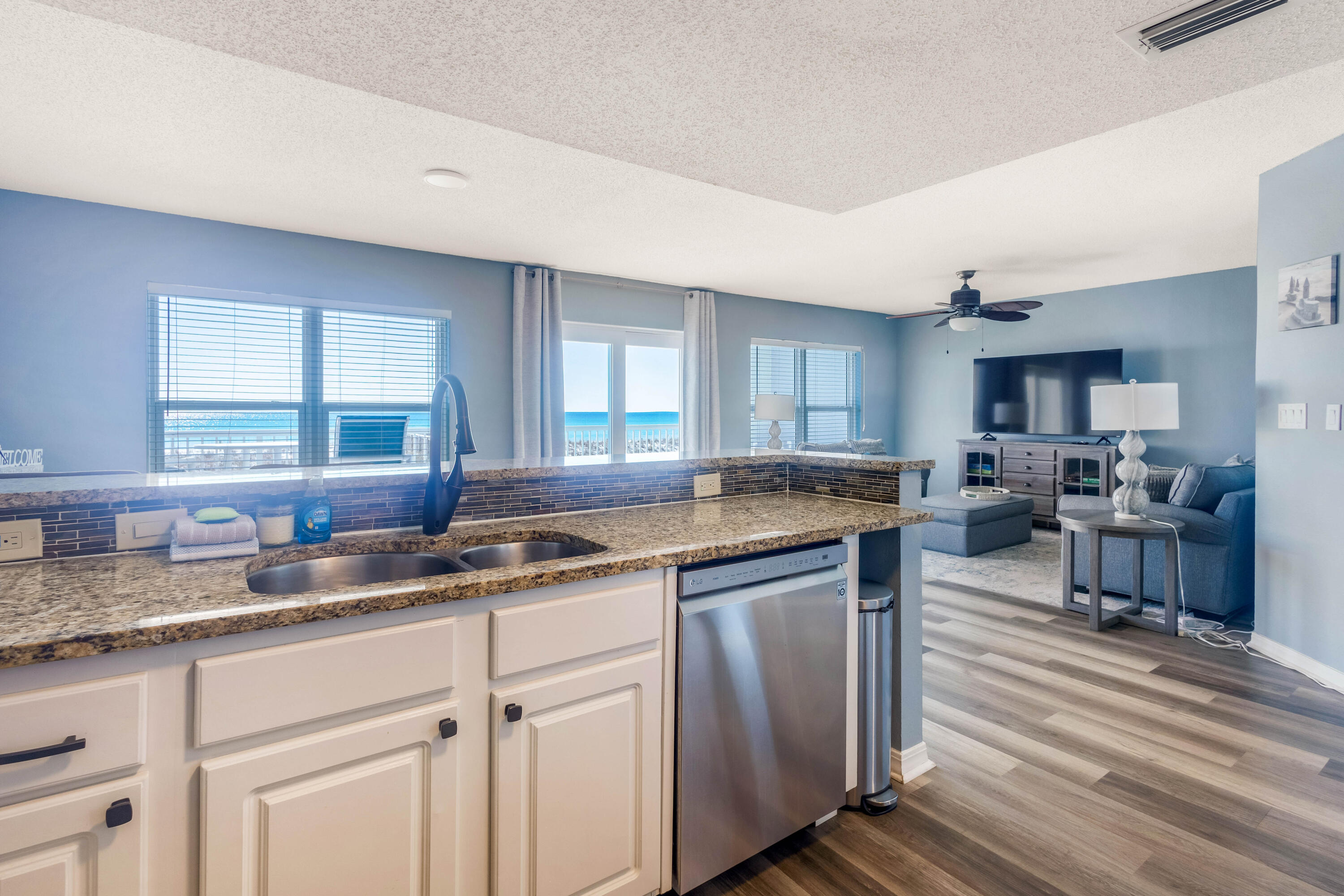 790 Santa Rosa Boulevard, Unit 2008 Fort Walton Beach, FL 32548 - Photo 24 of 33 a kitchen with stainless steel appliances granite countertop a sink stove and cabinets