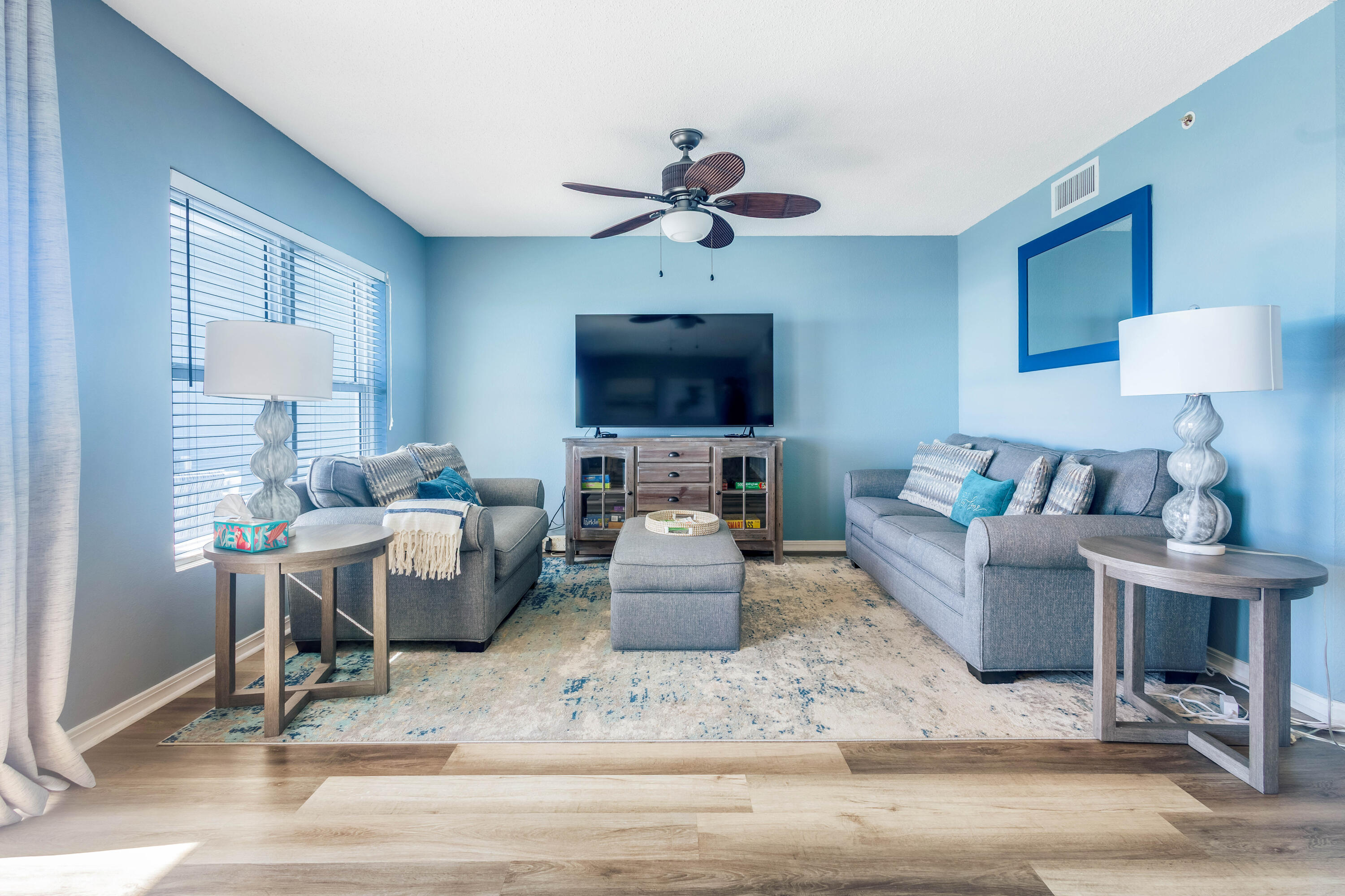 790 Santa Rosa Boulevard, Unit 2008 Fort Walton Beach, FL 32548 - Photo 29 of 33 a living room with furniture and a chandelier