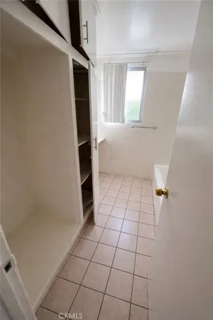 a view of an empty walk in closet