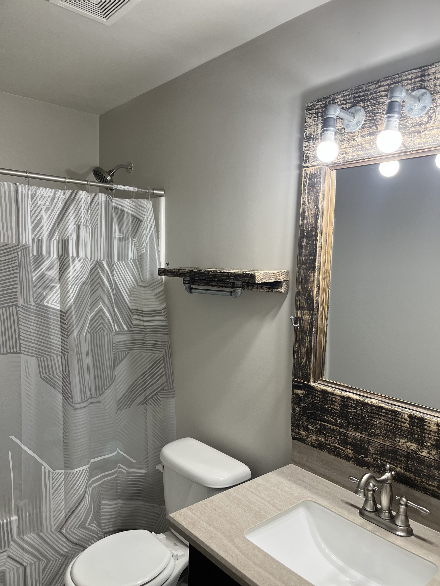 1005 Benwick Road Hendersonville, TN 37075 - Photo 6 of 12 a bathroom with a sink a toilet and shower
