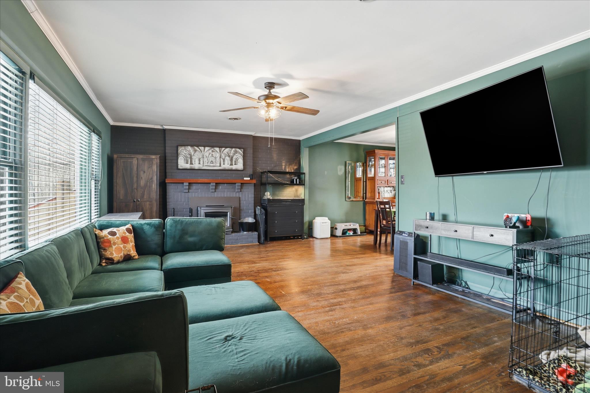 6415 South Clifton Road Frederick, MD 21703 - Photo 13 of 49 Wood fireplace with insert, blower