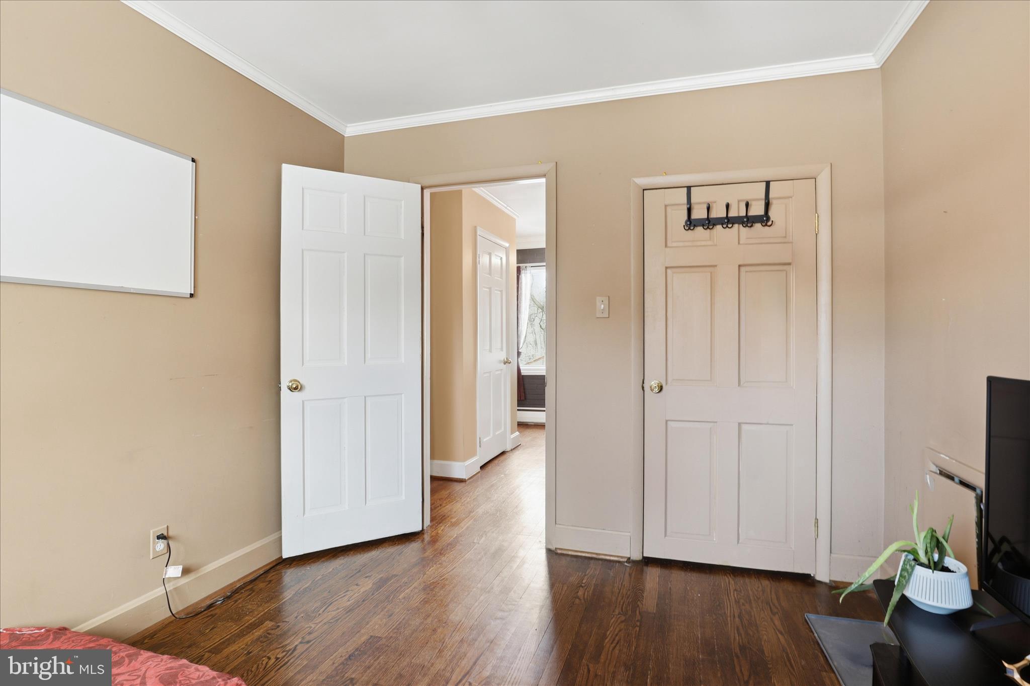6415 South Clifton Road Frederick, MD 21703 - Photo 14 of 53 a view of a livingroom with wooden floor