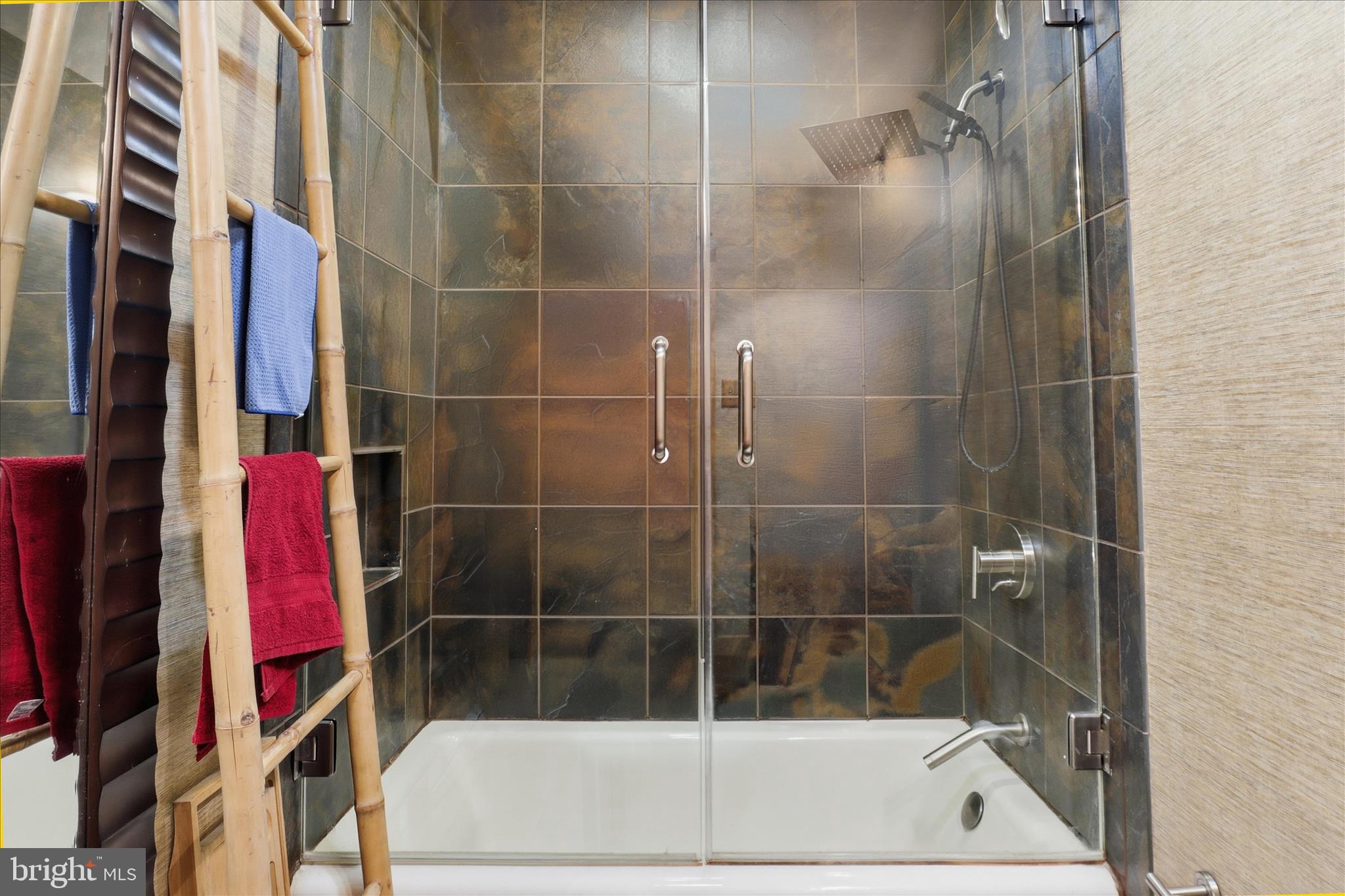 6415 South Clifton Road Frederick, MD 21703 - Photo 25 of 53 a bathroom with a bathtub and a shower