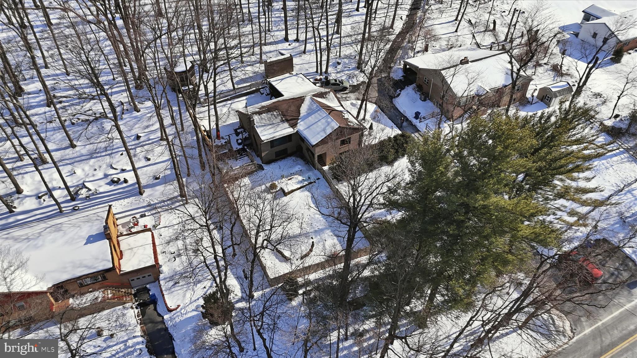 6415 South Clifton Road Frederick, MD 21703 - Photo 42 of 53 a backyard of a building with lots of trees