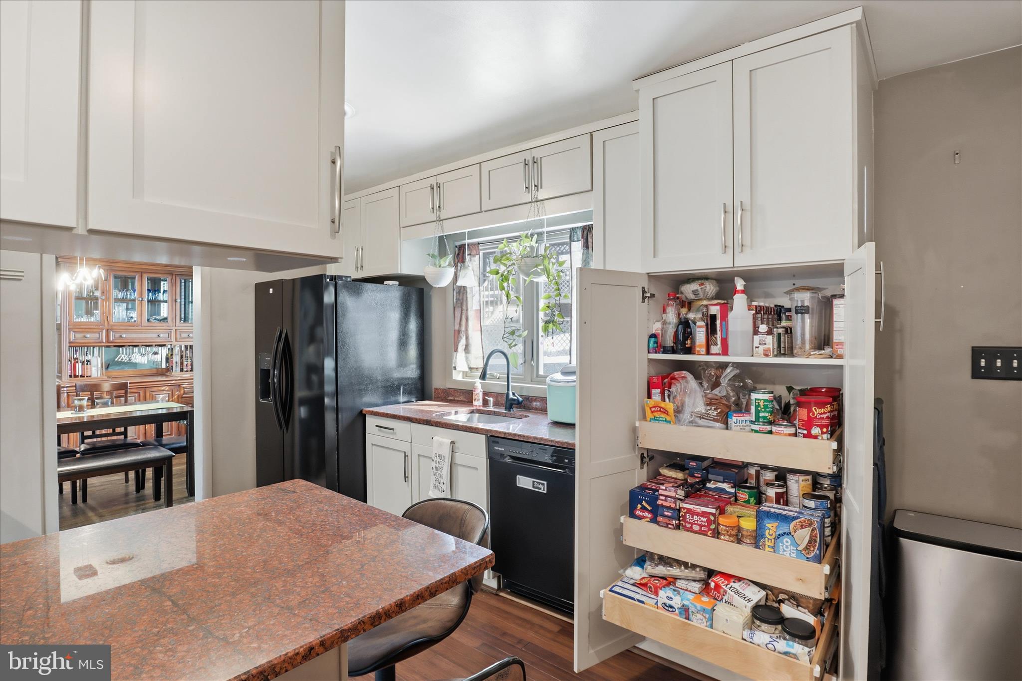 6415 South Clifton Road Frederick, MD 21703 - Photo 7 of 53 a kitchen with stainless steel appliances a refrigerator and a window