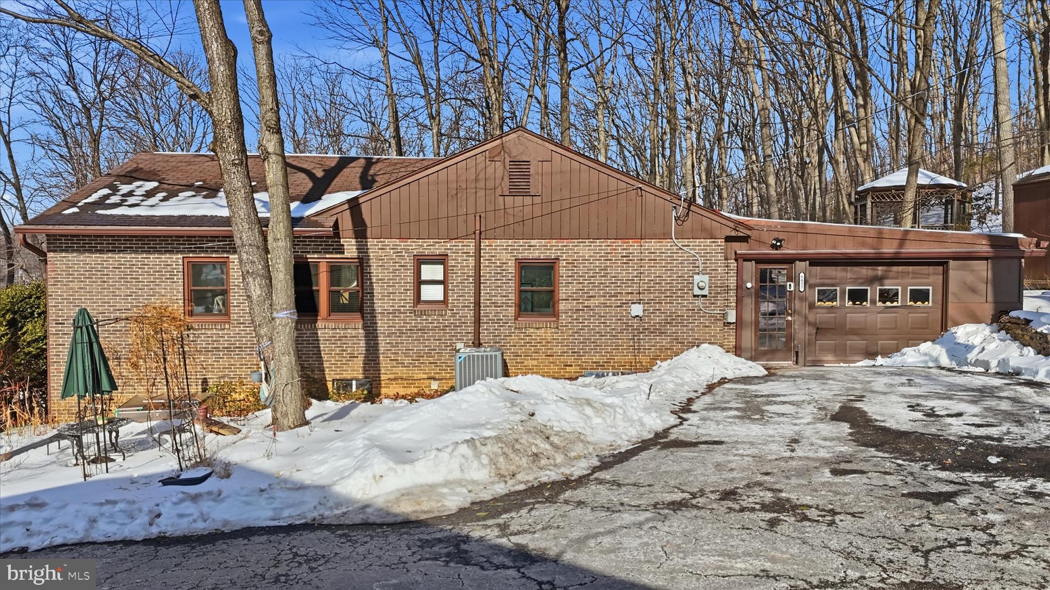6415 South Clifton Road Frederick, MD 21703 - Photo 10 of 53 a front view of a house with a yard