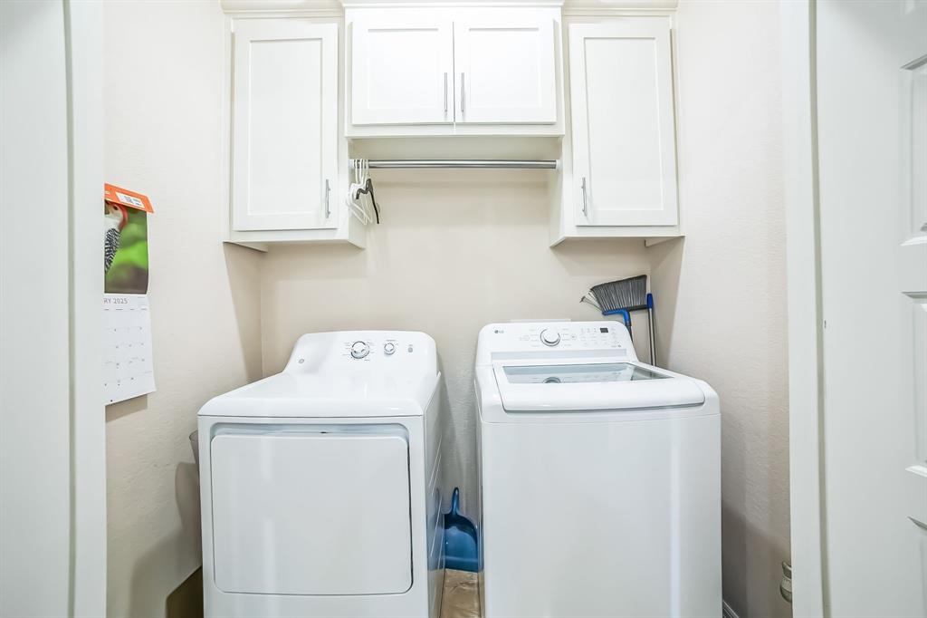 1207 South Lenox Street Tyler, TX 75701 - Photo 15 of 27 a utility room with dryer and washer