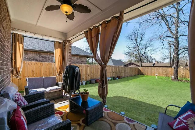 a outdoor living space with furniture and garden