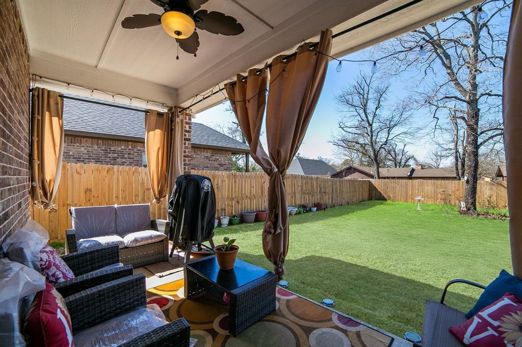 1207 South Lenox Street Tyler, TX 75701 - Photo 26 of 27 a outdoor living space with furniture and garden