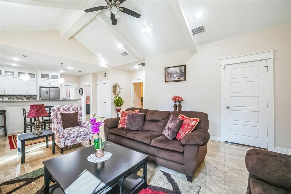 1207 South Lenox Street Tyler, TX 75701 - Photo 6 of 27 a living room with furniture and kitchen view