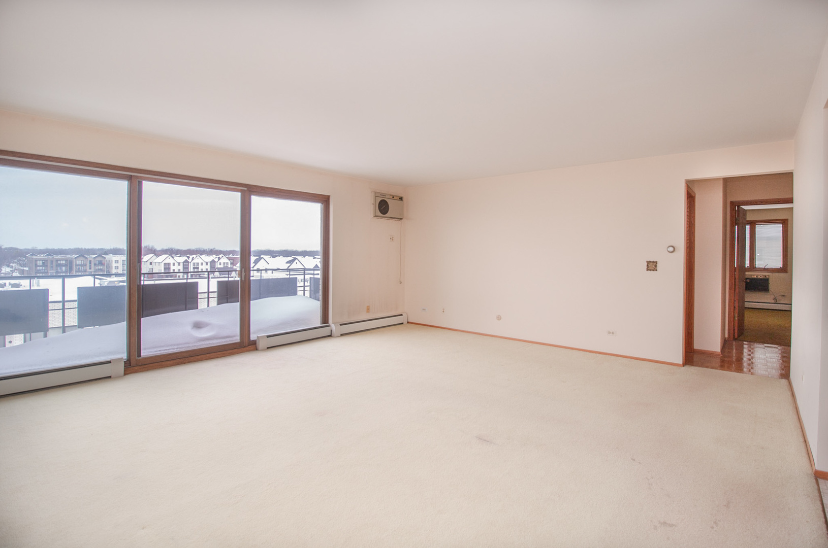 8045 O Connor Drive, Unit 6A River Grove, IL 60171 - Photo 2 of 8 a view of an empty room with a window