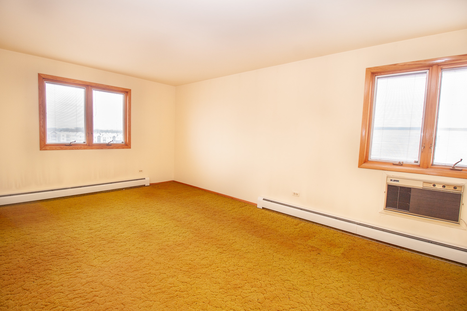 8045 O Connor Drive, Unit 6A River Grove, IL 60171 - Photo 6 of 8 an empty room with a window