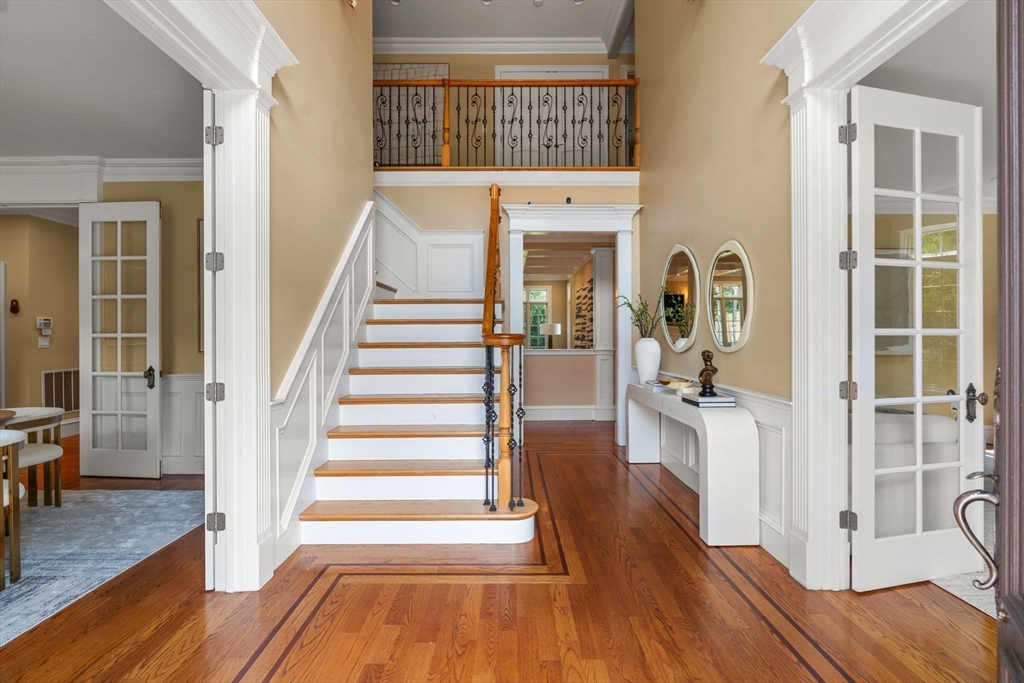 22 Scotney Road Newton, MA 02467 - Photo 22 of 42 a view of a bedroom with wooden floor and windows