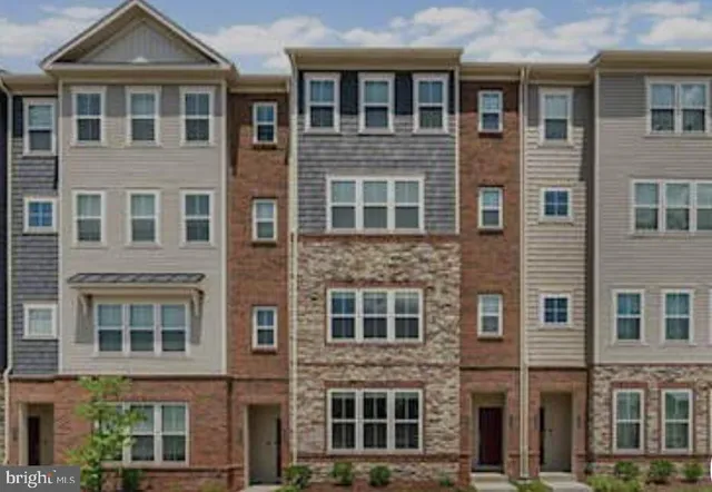 a front view of a building with windows
