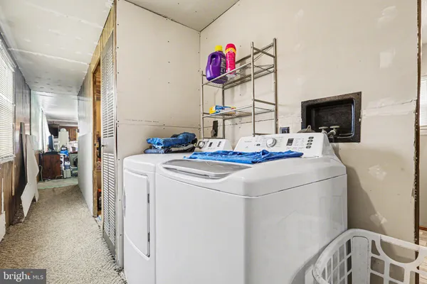 a room that has a bed and a tv in it