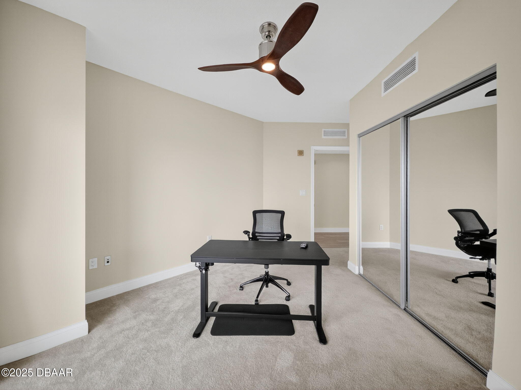 231 Riverside Drive, Unit 2409 Holly Hill, FL 32117 - Photo 20 of 24 a workspace with furniture and a window