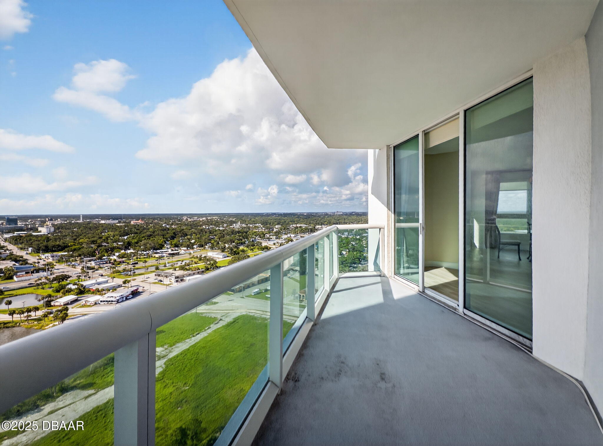 231 Riverside Drive, Unit 2409 Holly Hill, FL 32117 - Photo 5 of 24 a view of a balcony with city