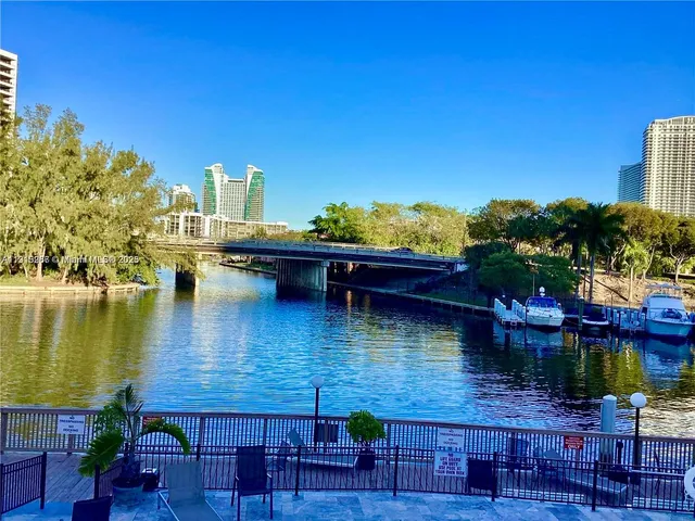 a view of swimming pool with outdoor seating