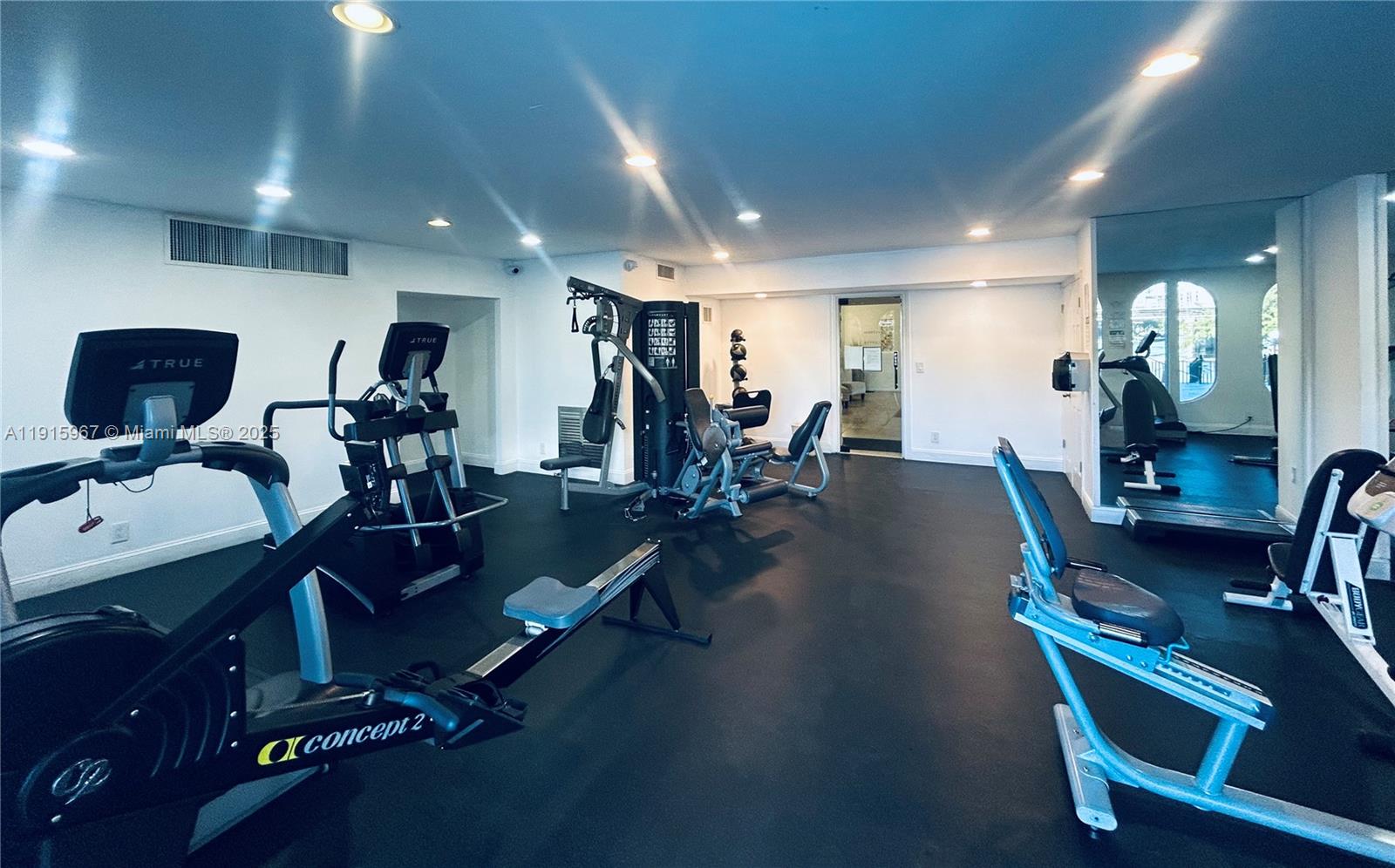 200 Diplomat Parkway, Unit 721 Hallandale Beach, FL 33009 - Photo 42 of 47 a view of a room with gym equipment