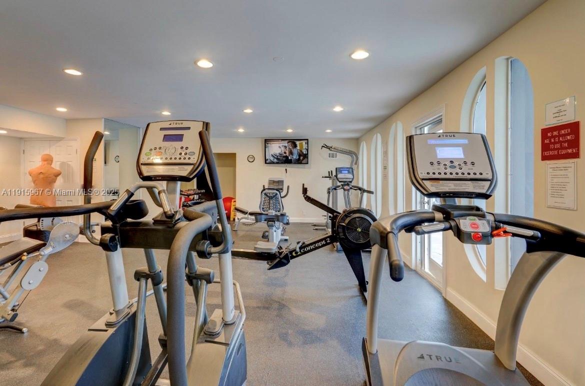 200 Diplomat Parkway, Unit 721 Hallandale Beach, FL 33009 - Photo 44 of 47 a view of a room with gym equipment