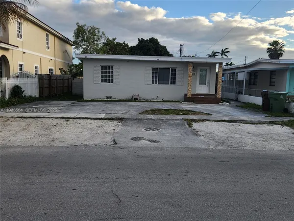 a view of a house with a patio