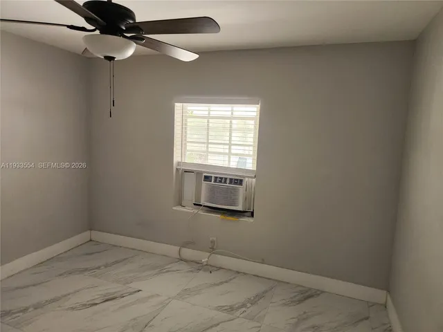 a view of a window in an empty room