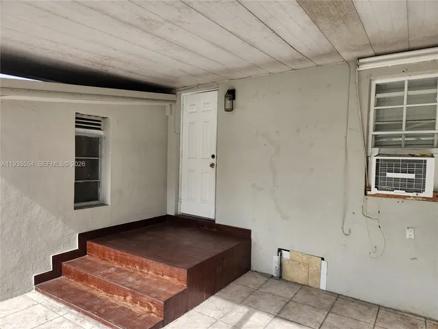 a view of kitchen and a sink