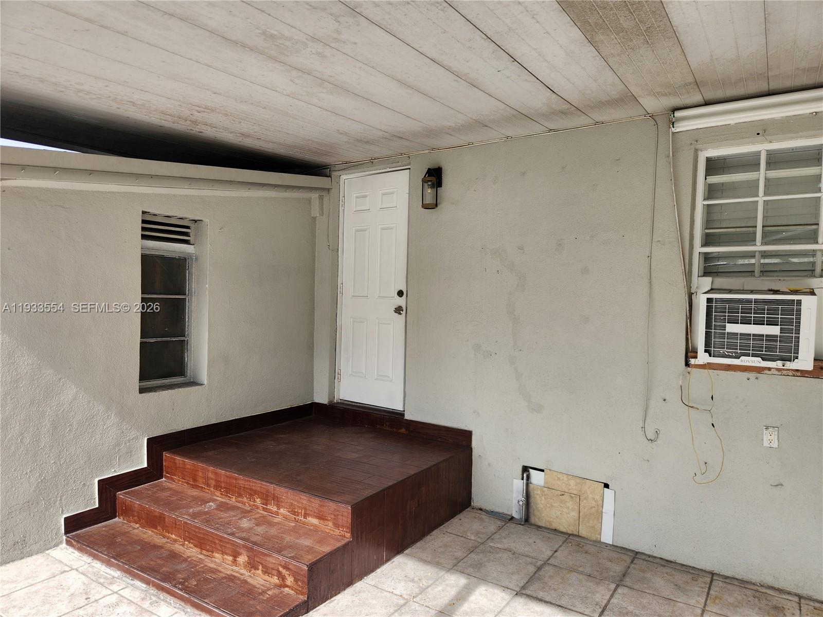 342 East 46th Street, Unit 2 Hialeah, FL 33013 - Photo 2 of 15 a living room with a couch