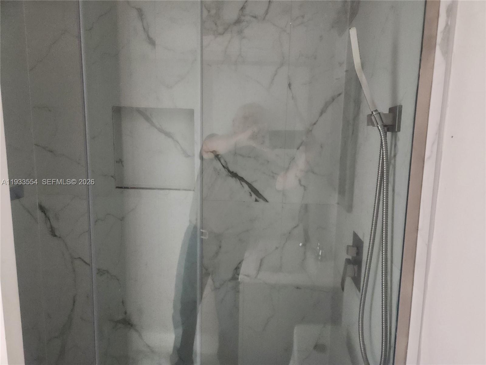 342 East 46th Street, Unit 2 Hialeah, FL 33013 - Photo 7 of 15 a bathroom with a shower